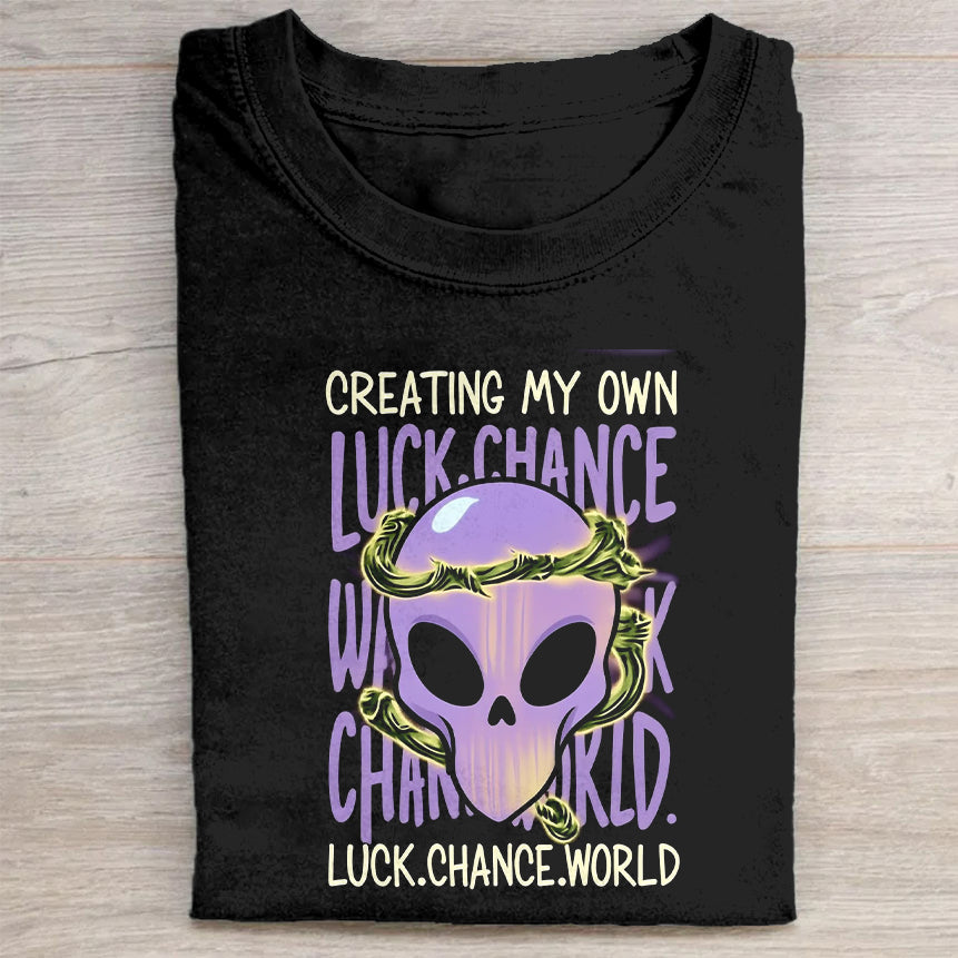 Creating My Own Luck Chance World Purple Alien Graphic T-Shirt
